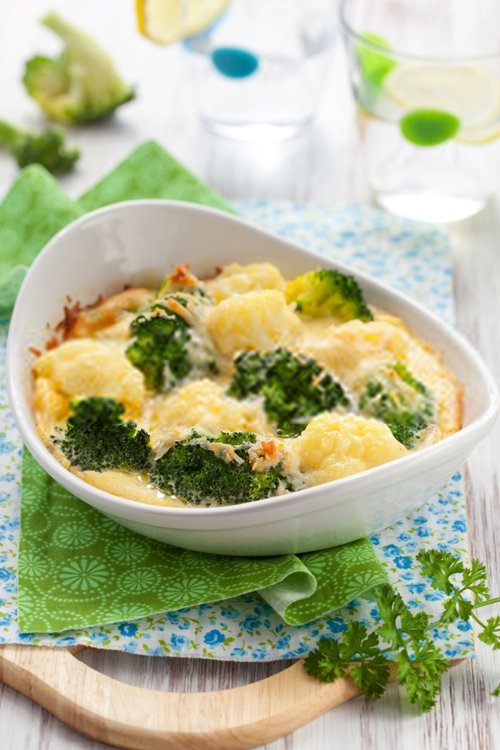 Broccoli and Cauliflower Gratin. While the broccoli and cauliflower are cooking, take a mixing bowl and mix the yoghurt, cheese and the mustard well, remembering to season the mixture with pepper.